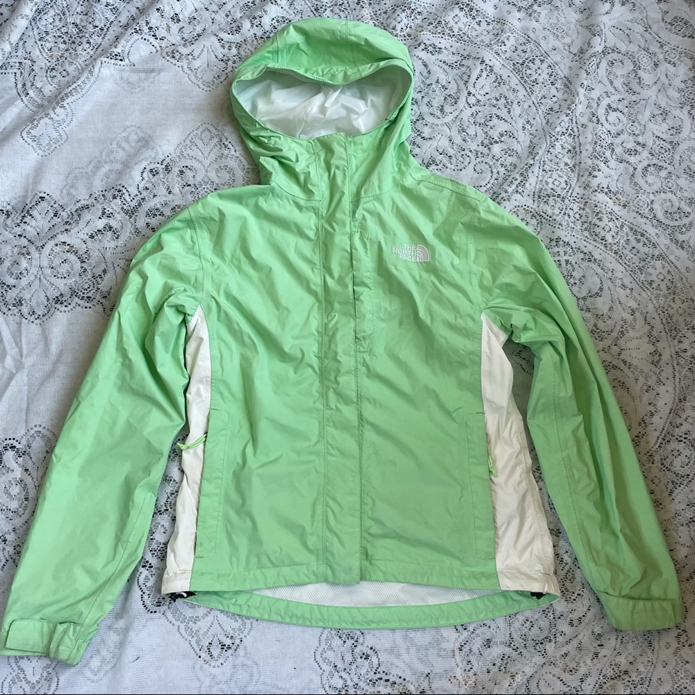 The north face women’s windbreaker mint green and white